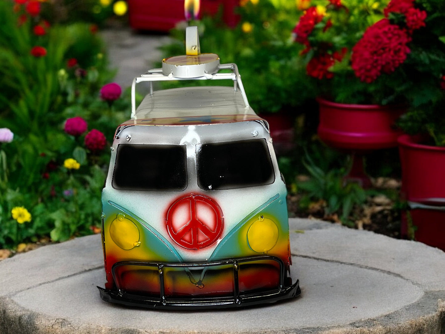 Colorful Hippie Metal Volkswagen truck with surfboard