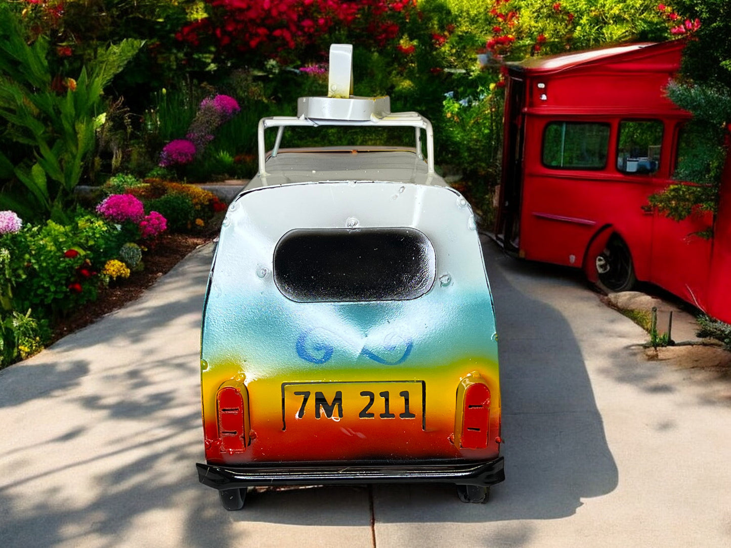 Colorful Hippie Metal Volkswagen truck with surfboard